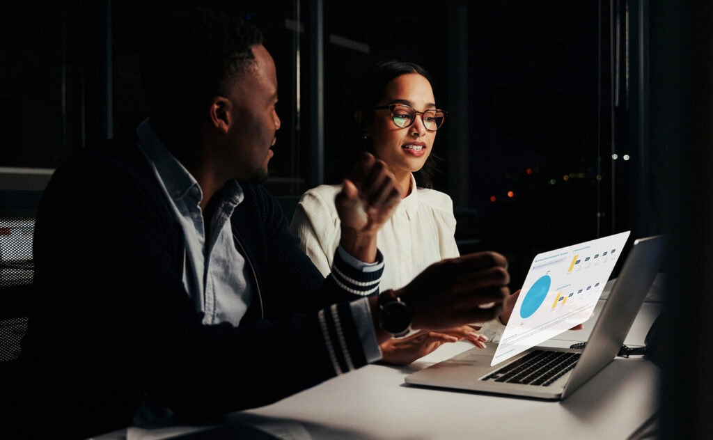 Marketers looking at dashboards and reporting within email software
